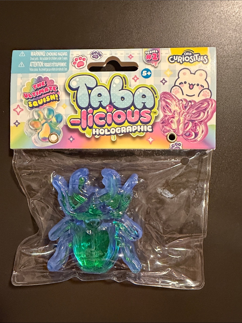 Tabalicious Holographic Blue-Green Bug Squishy Toy